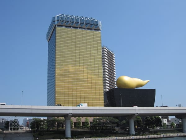 朝日啤酒,據說那個是啤酒泡沫的意思?